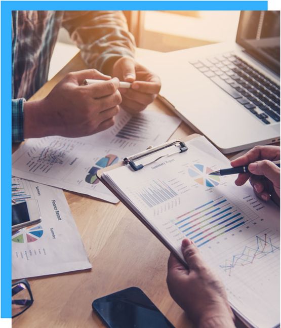 Image table with charts and graphs on work desk 